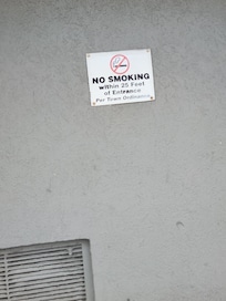 Billy Smokes all day next to this sign its the only time hes not showing his ass crack
