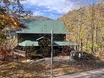 Cabin view from fire pit area.