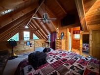 Upstairs loft (king bed and futon couch)