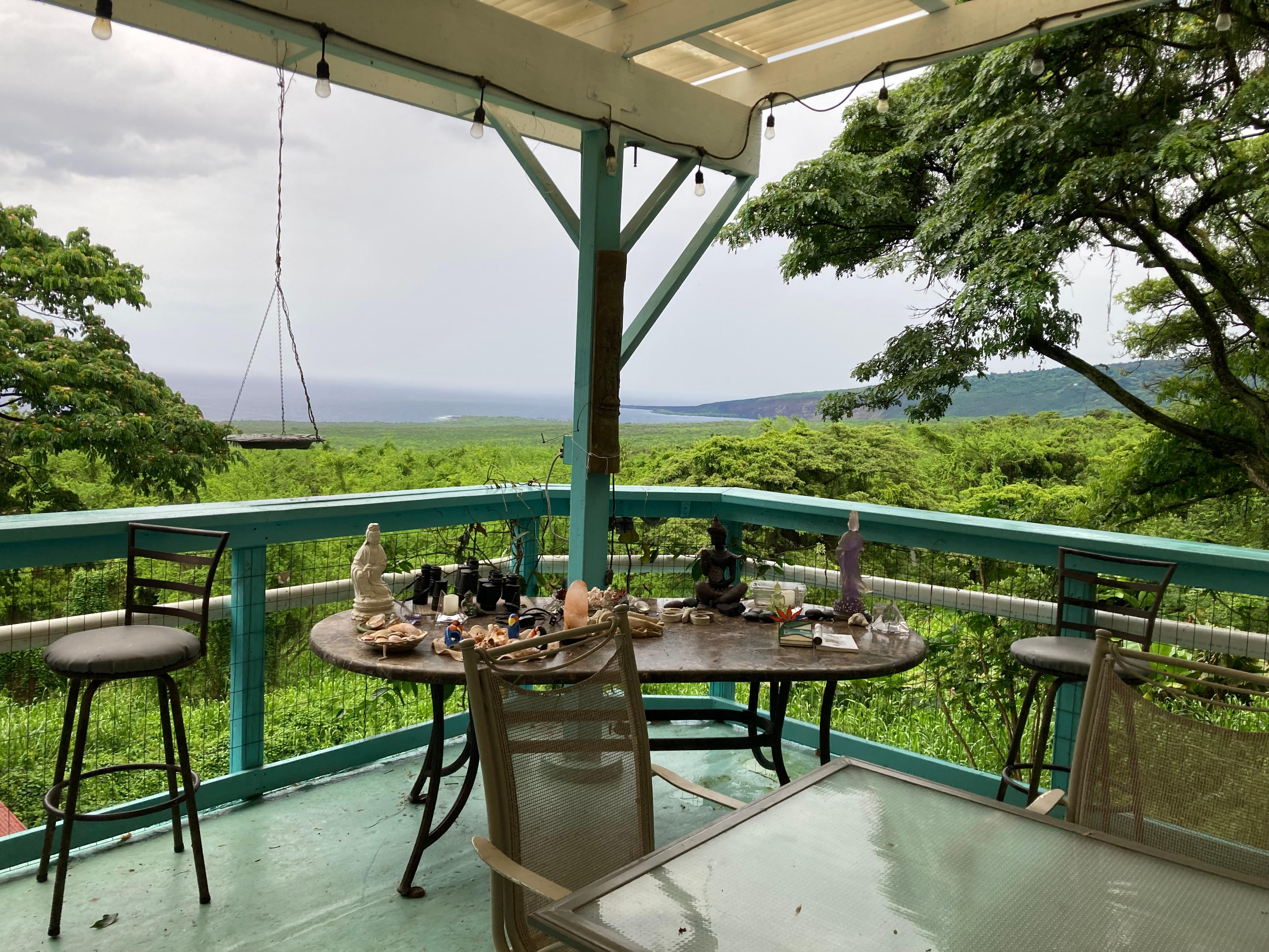 Outside on the guest deck. There is a second guest deck and kitchen!