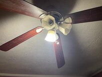 One of three bulbs working, fan is actually at head height