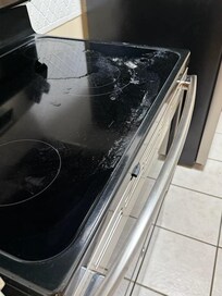 Water leak from roof in microwave and on stove top