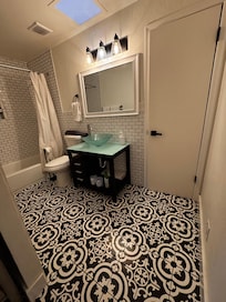 Upstairs has three bed rooms and this shared bath