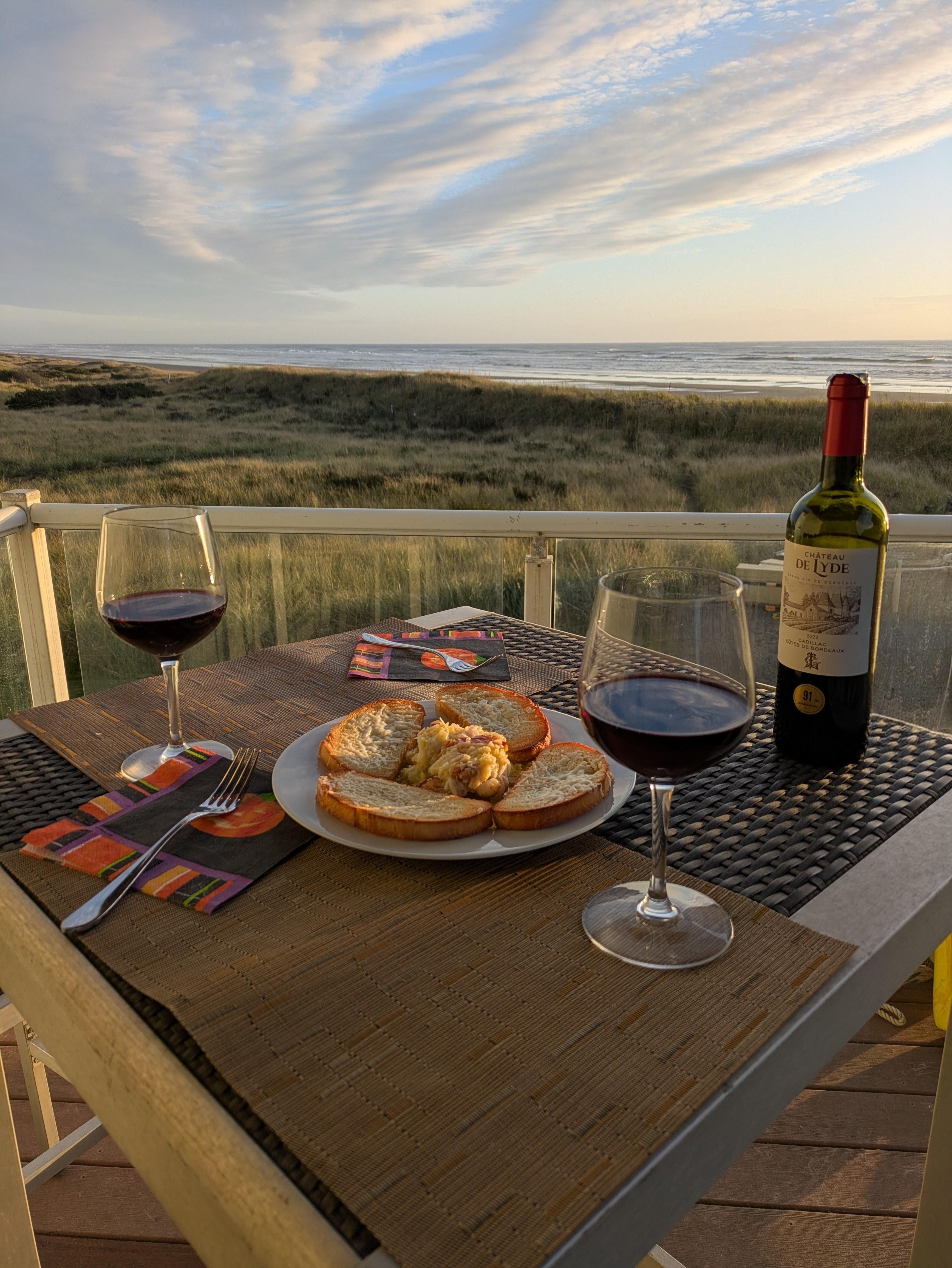 Dinner on the deck of fresh crab with garlic butter and toasted Italian bread with Romano.  Good fresh seafood at Merino's in town