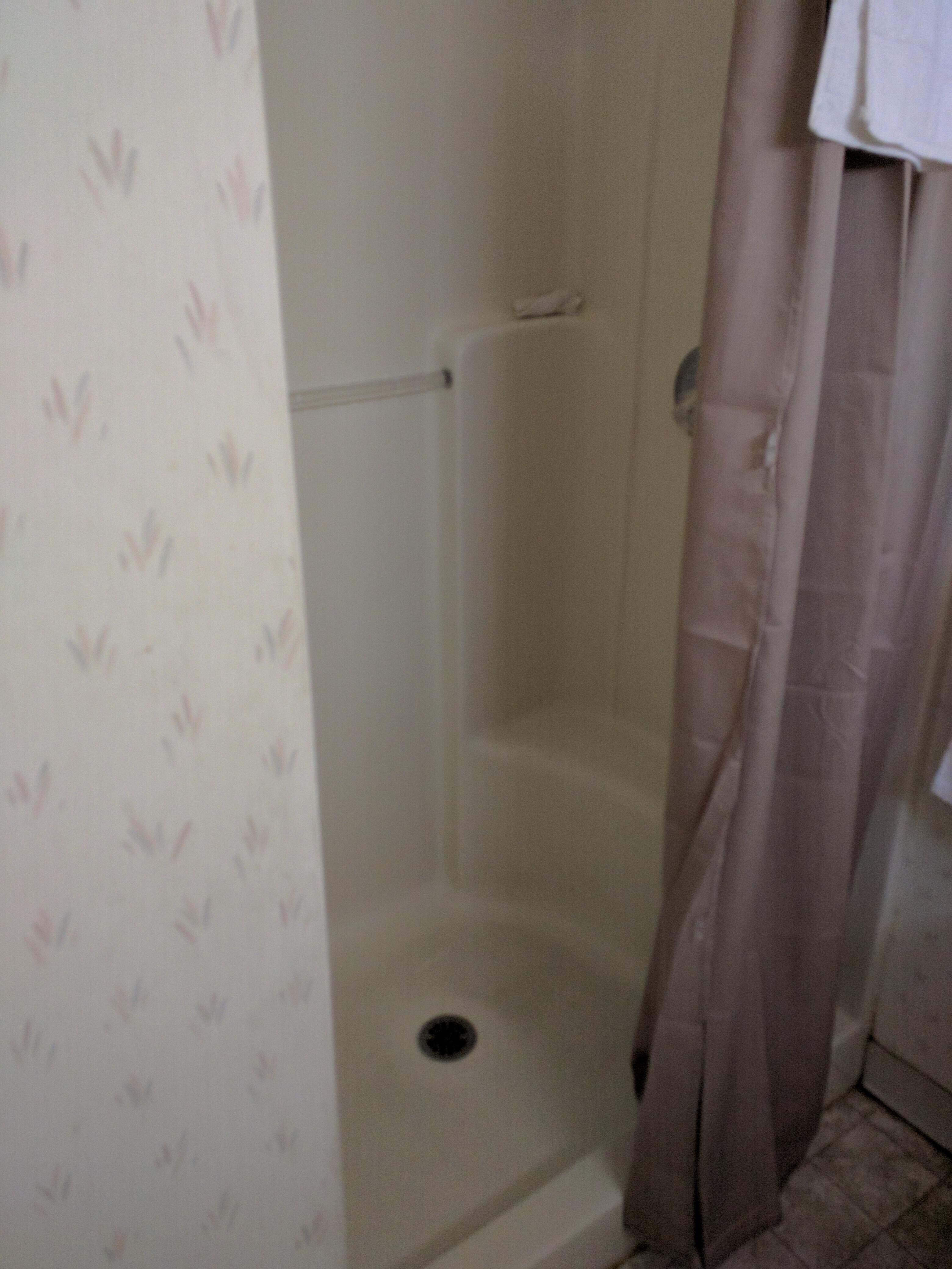 Shower floor old & dingy