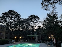 Pool-side view at night - steps from the townhome.