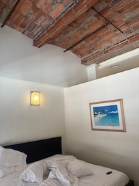 Main bedroom with beautiful, authentic (?) ceiling materials.