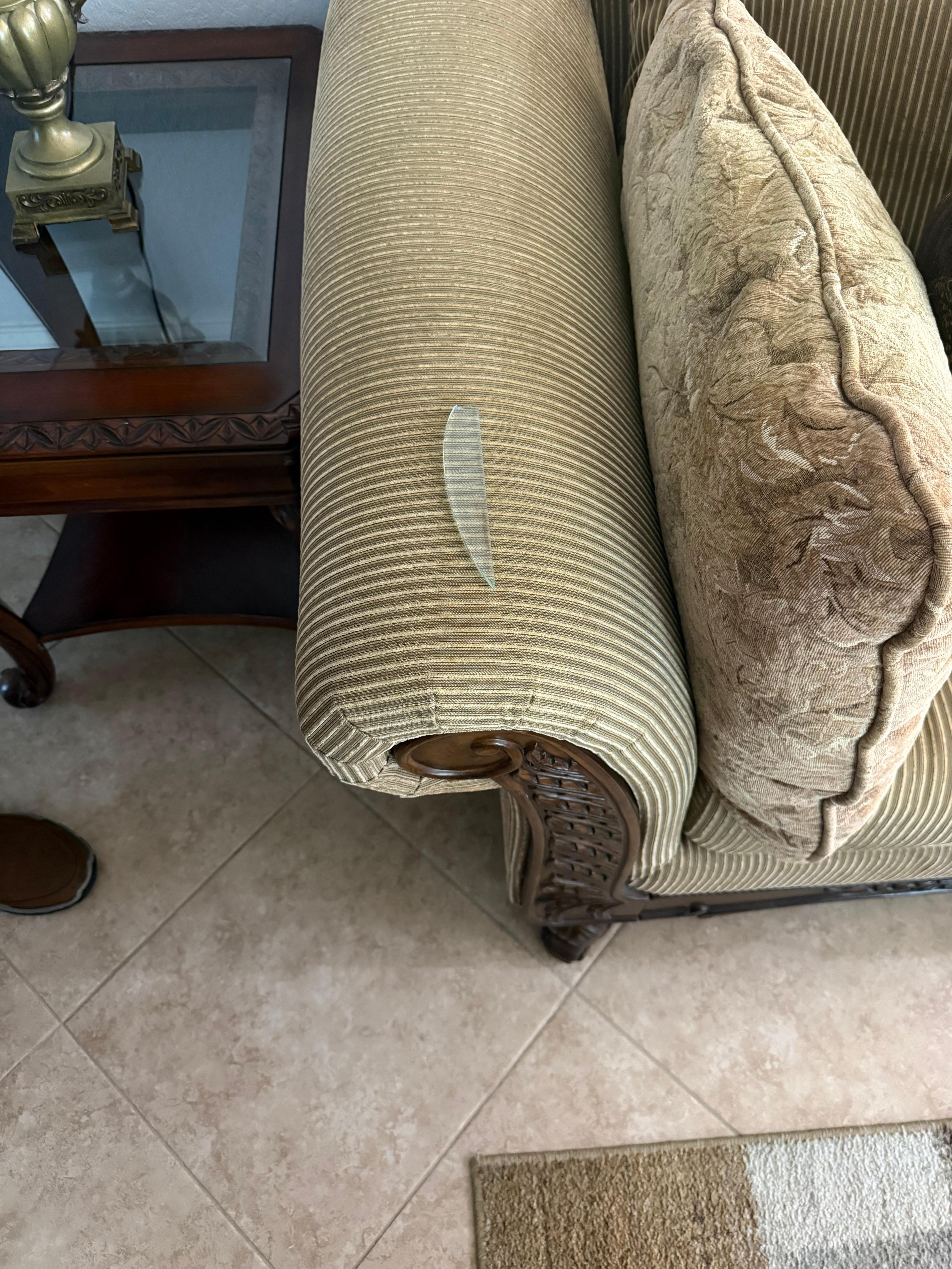 Glass shard on couch arm