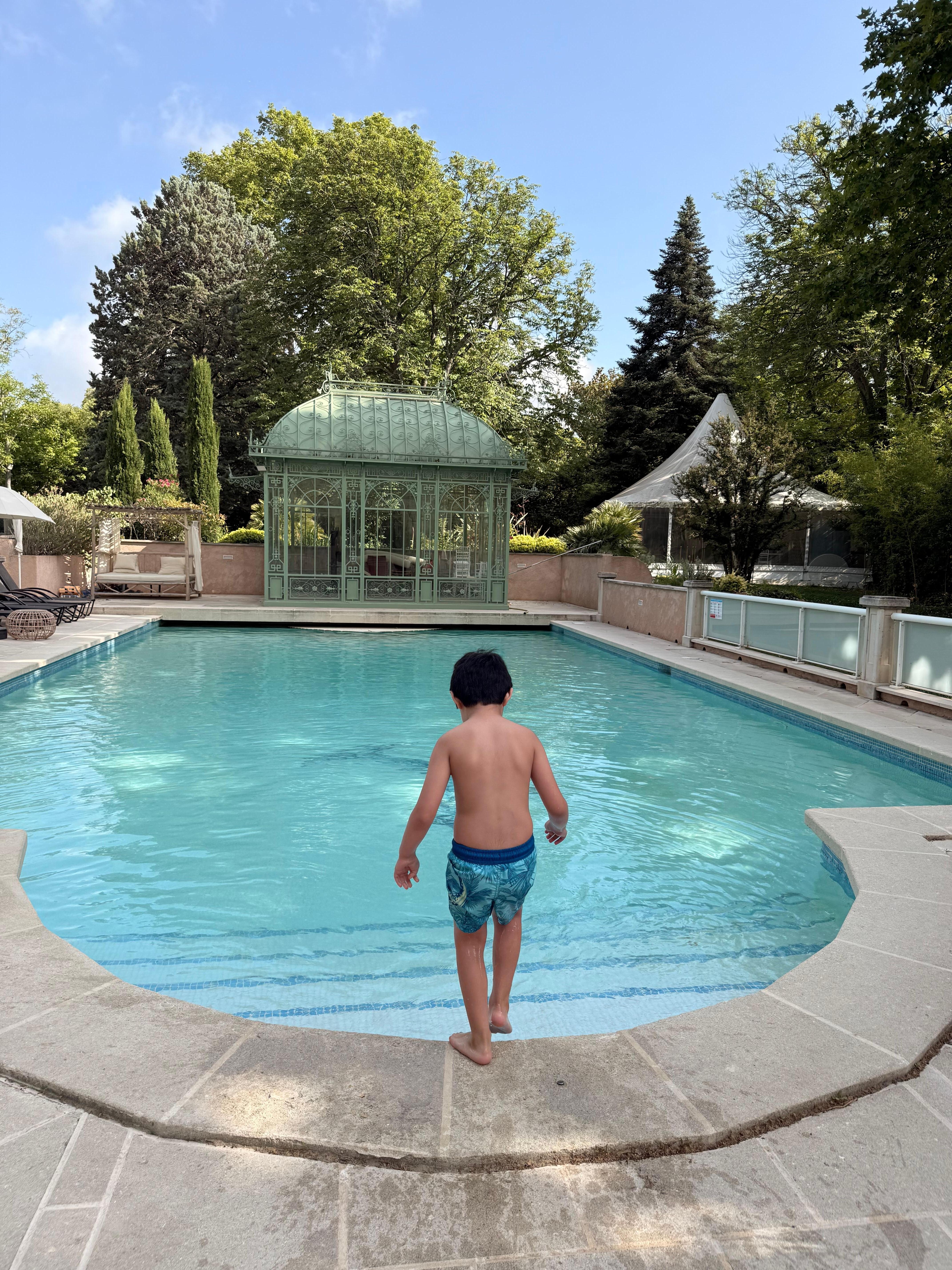Photo of the pool area with my son