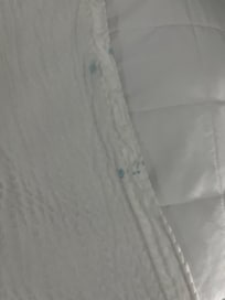 Bedding all the way down to mattress cover had stains of all sorts