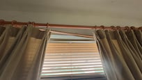 Damaged window covering