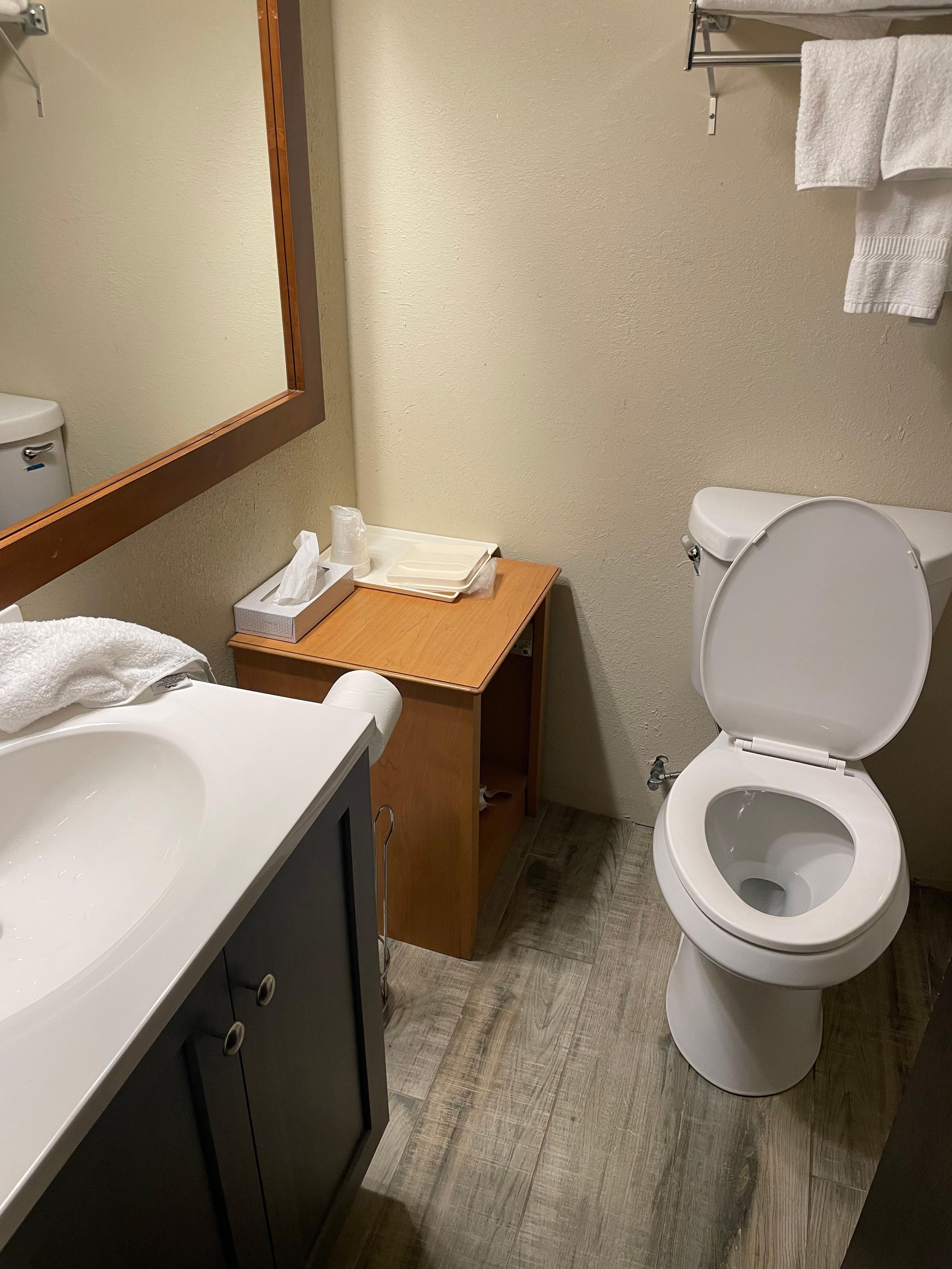 Bathroom mismatched cabinetry and lack of finishing 