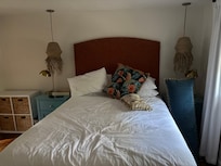 This is a very comfy bedroom.