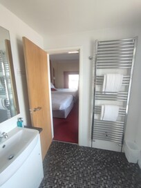 View from bathroom into the bedroom.