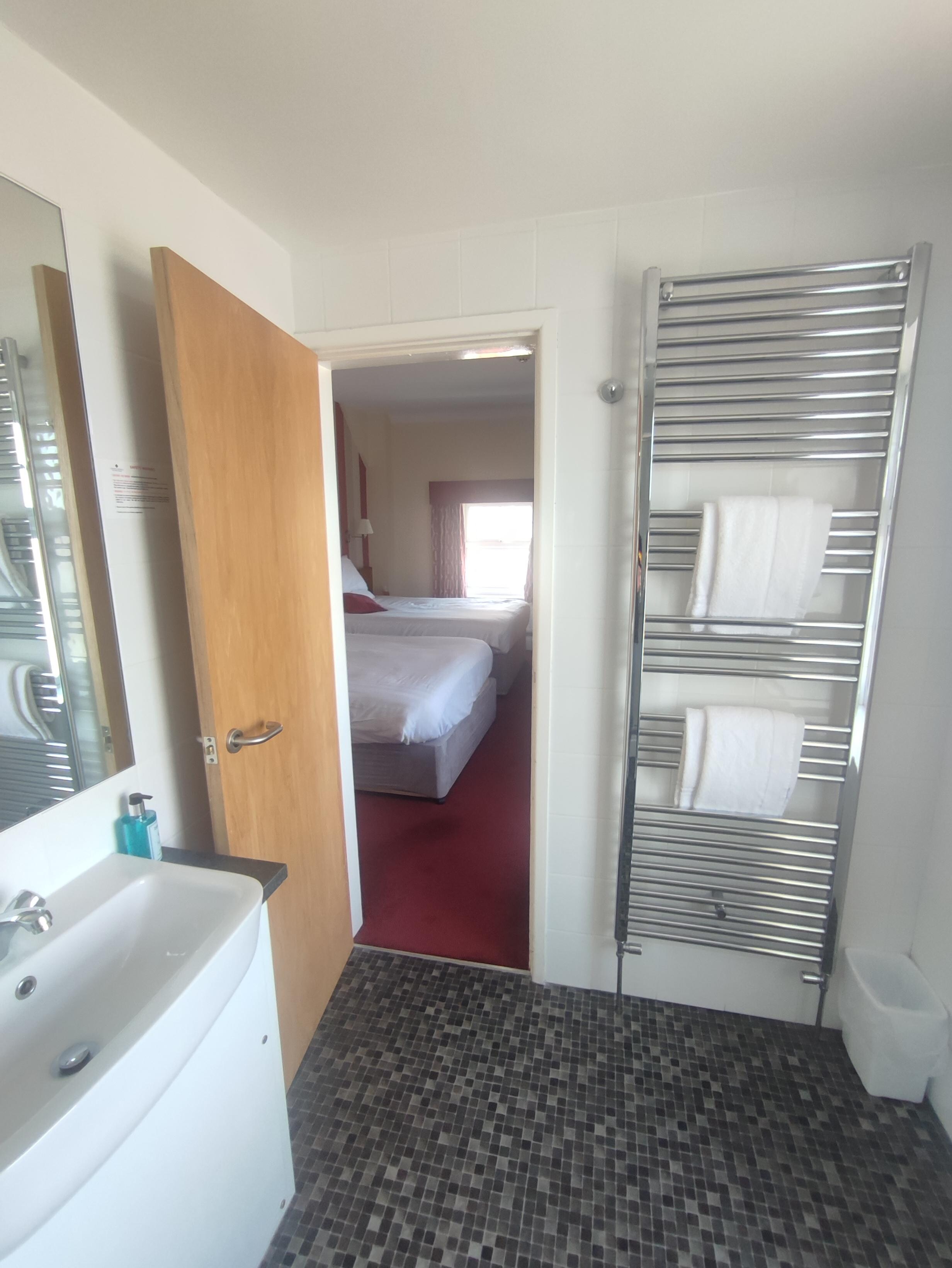 View from bathroom into the bedroom.
