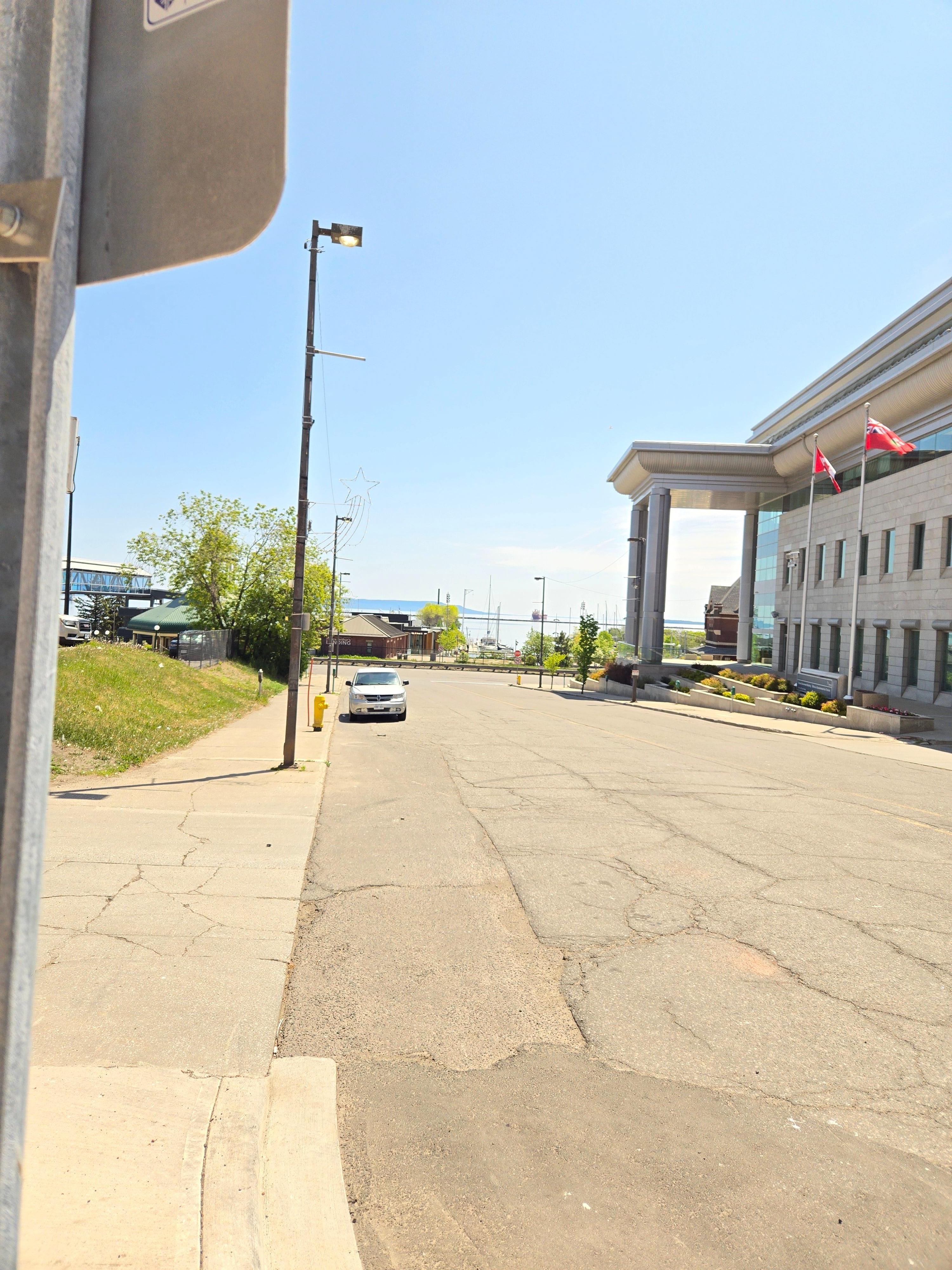Side of hotel near entrance parking looking at Lake Superior