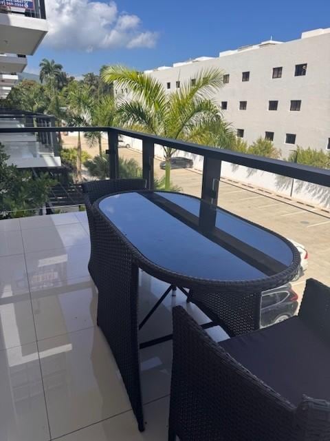 View from balcony overlooking the gated parking lot.  