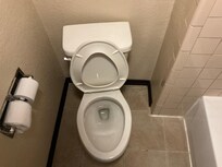 Toilet loose and turned sideway.leaking sewer gases