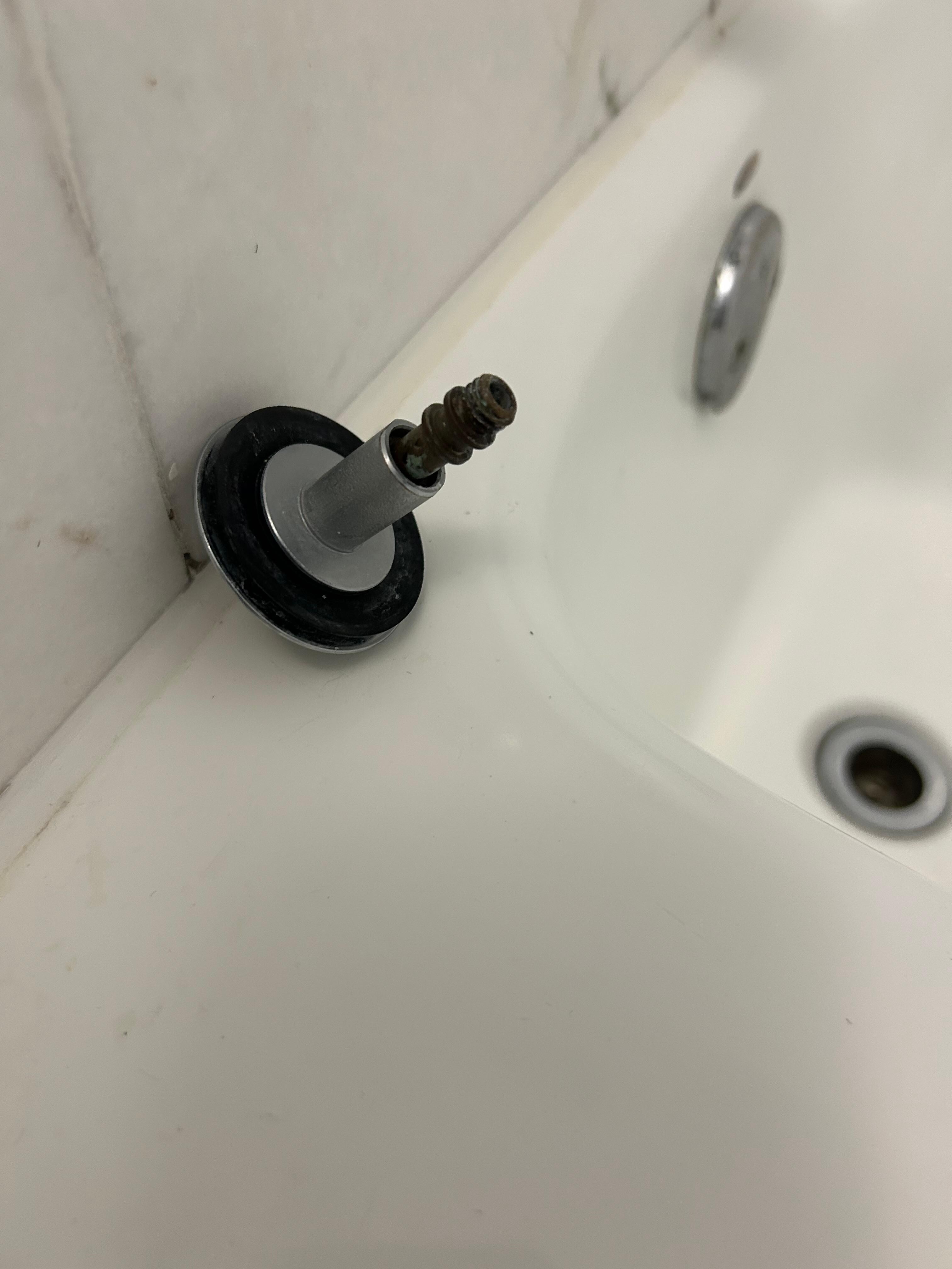 I think this piece might be the tub drain not sure