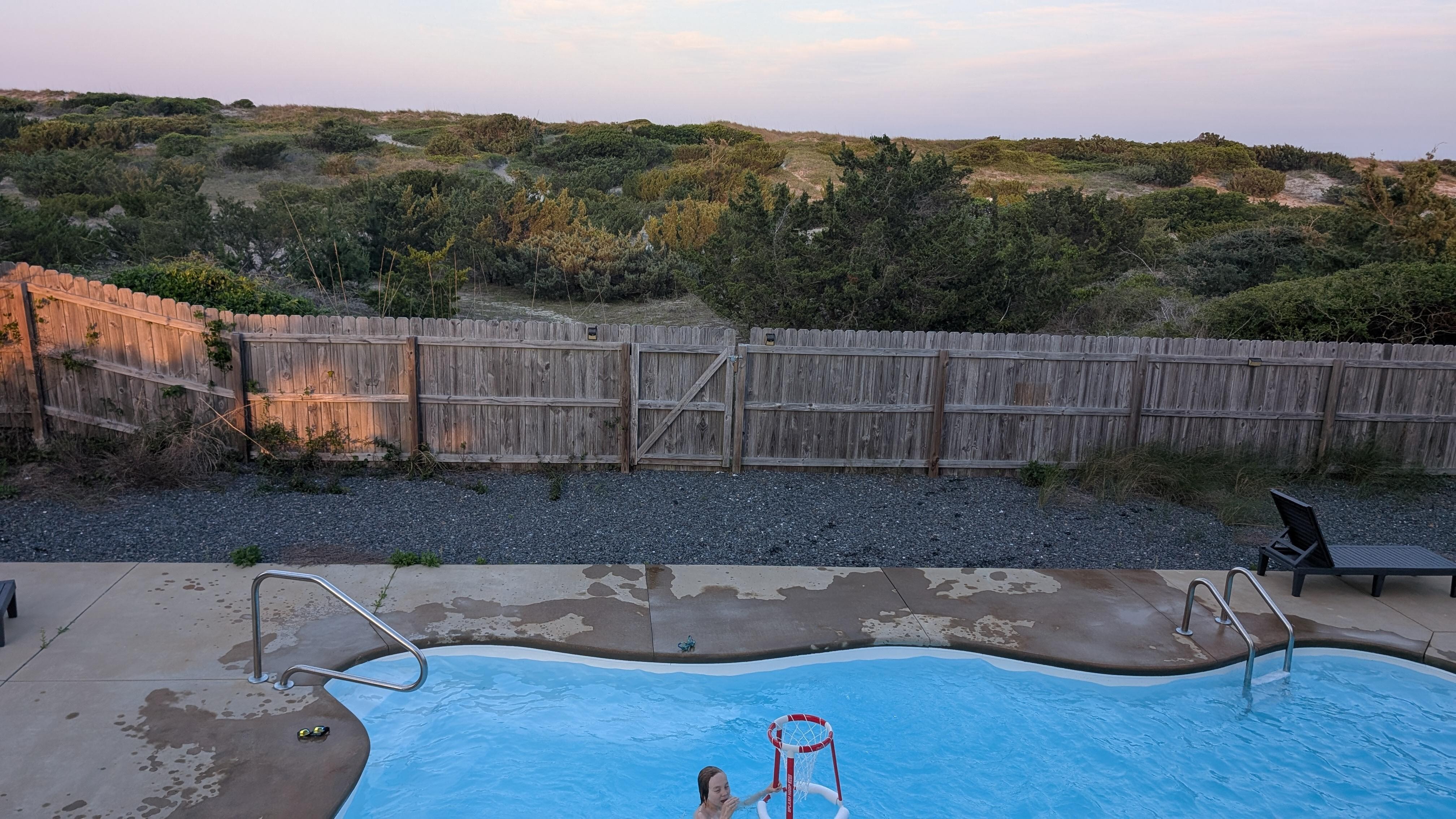 Main deck view of pool and dunes 