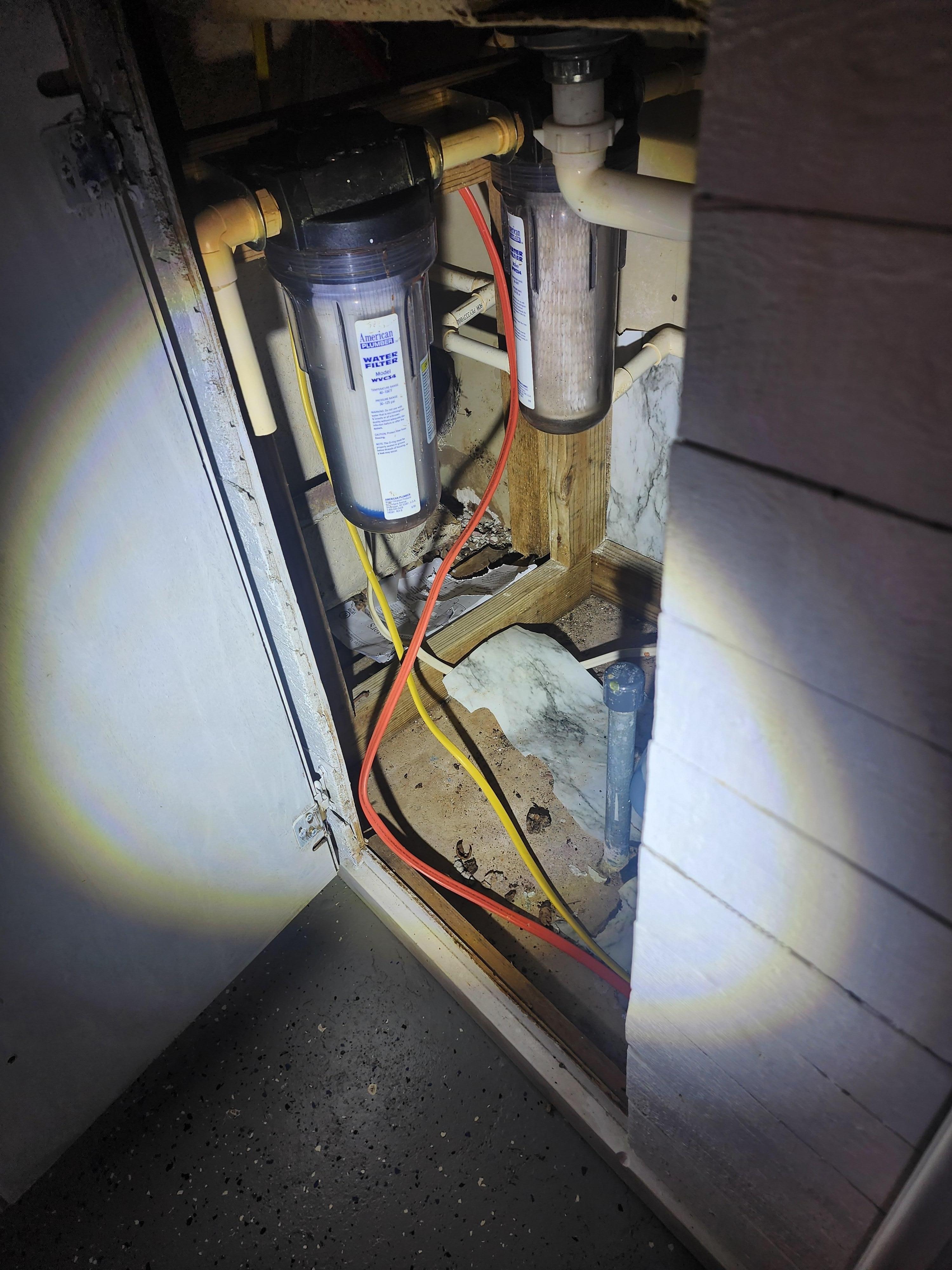 Under the sink where we heard and saw a rodent our first night. 