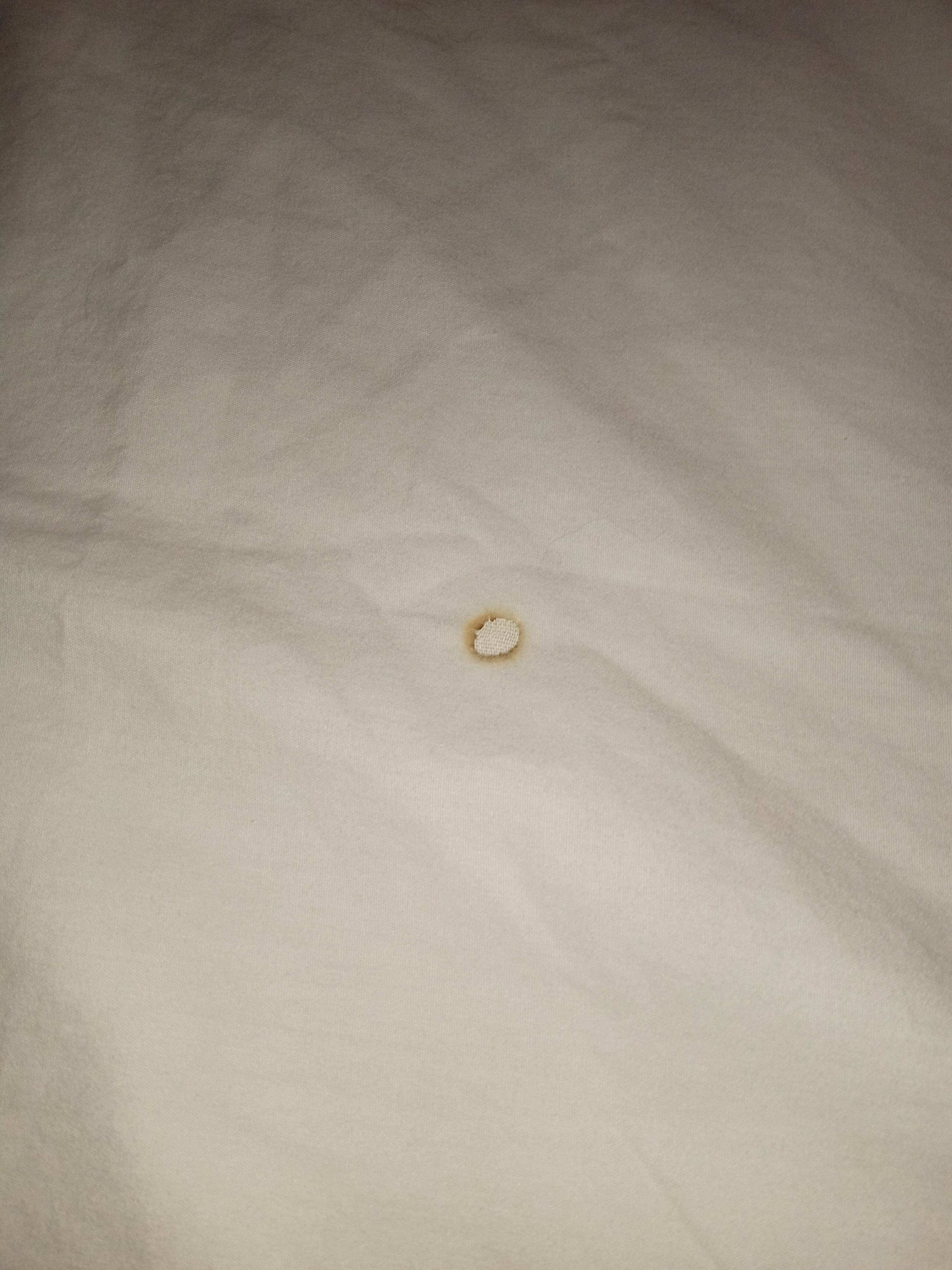 Cigarette burns in sheets. Also dirty.