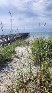 View on top of the dune beside the pier.
