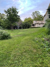 Gathering in yard around the firepit