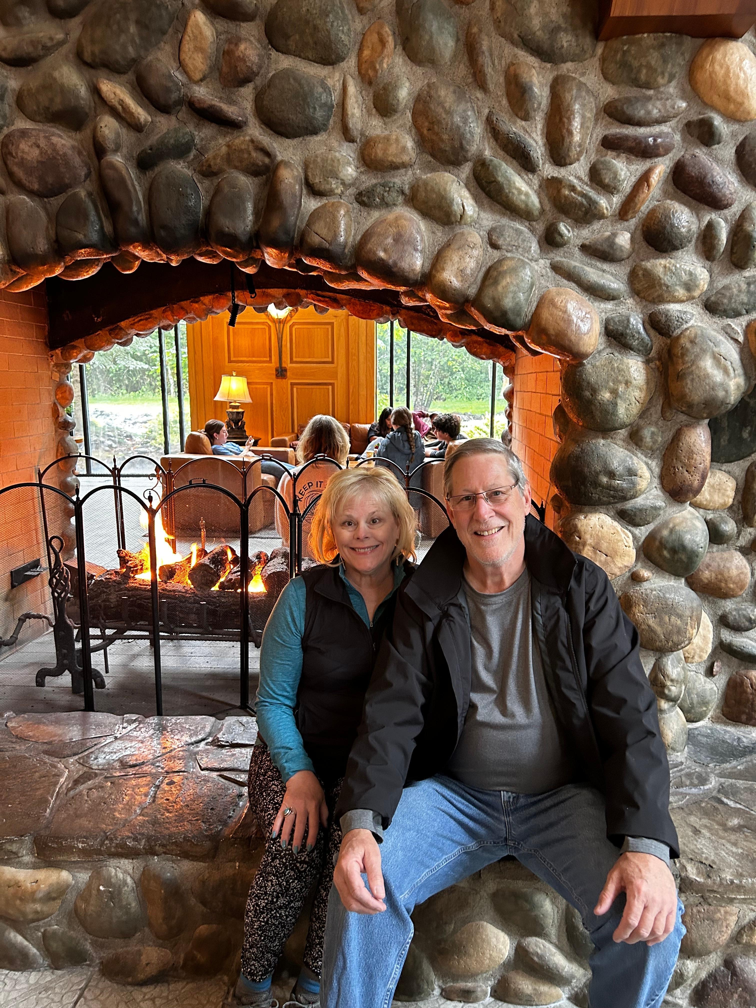 We enjoyed the center cobblestone fireplace on a rainy day.
