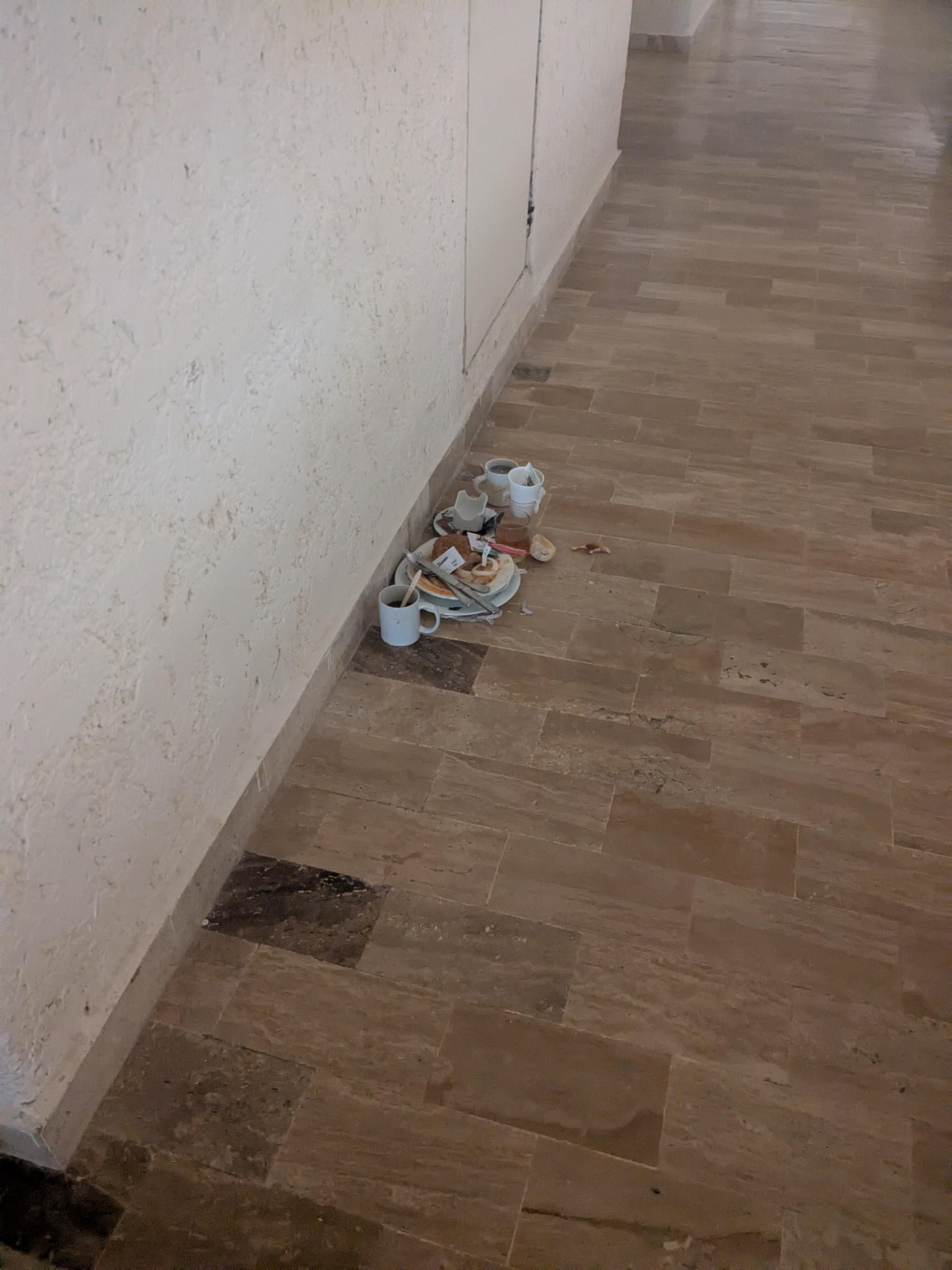 Dirty dishes in hallway for hours