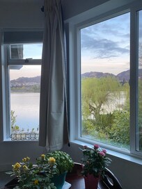 View of lake from loveseat in main bedroom