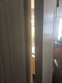 Bathroom door, huge gaps, no lock.