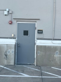 No keypad and the word Garage - once u open the door there is a keypad but that isn’t what is on his PDF. There is another Gray door at the other building with a keypad. So it was confusing.