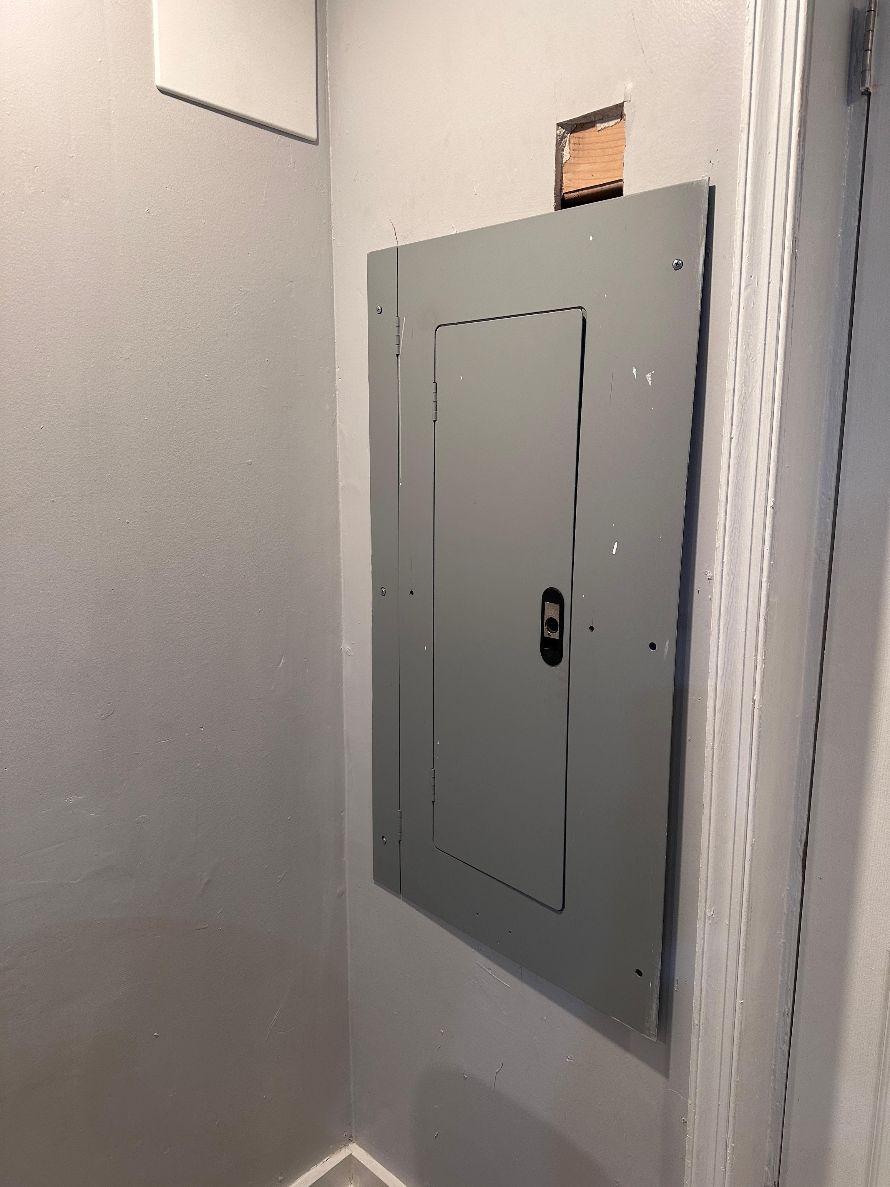 I should have took more pictures, but this is the panel not very securely fastened w a few random screws holding it in place. 