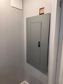 I should have took more pictures, but this is the panel not very securely fastened w a few random screws holding it in place.