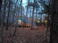 View of dome with privacy screen and house in background