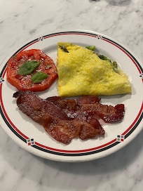 Veggie omelette with Brie, heirloom tomato and bacon