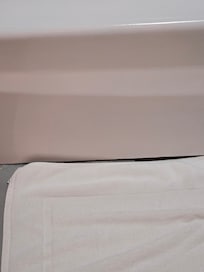 Gaps between the cold concrete and tub.