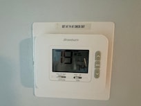 Temperature in the unit with the AC running blowing warm air