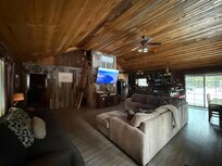 Living room, kitchen, dining, back patio