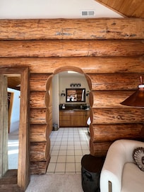 Looking into master bathroom.