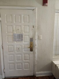 Deadbolt removed, walls damaged