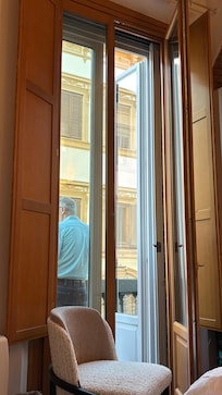 Small balcony, giant windows