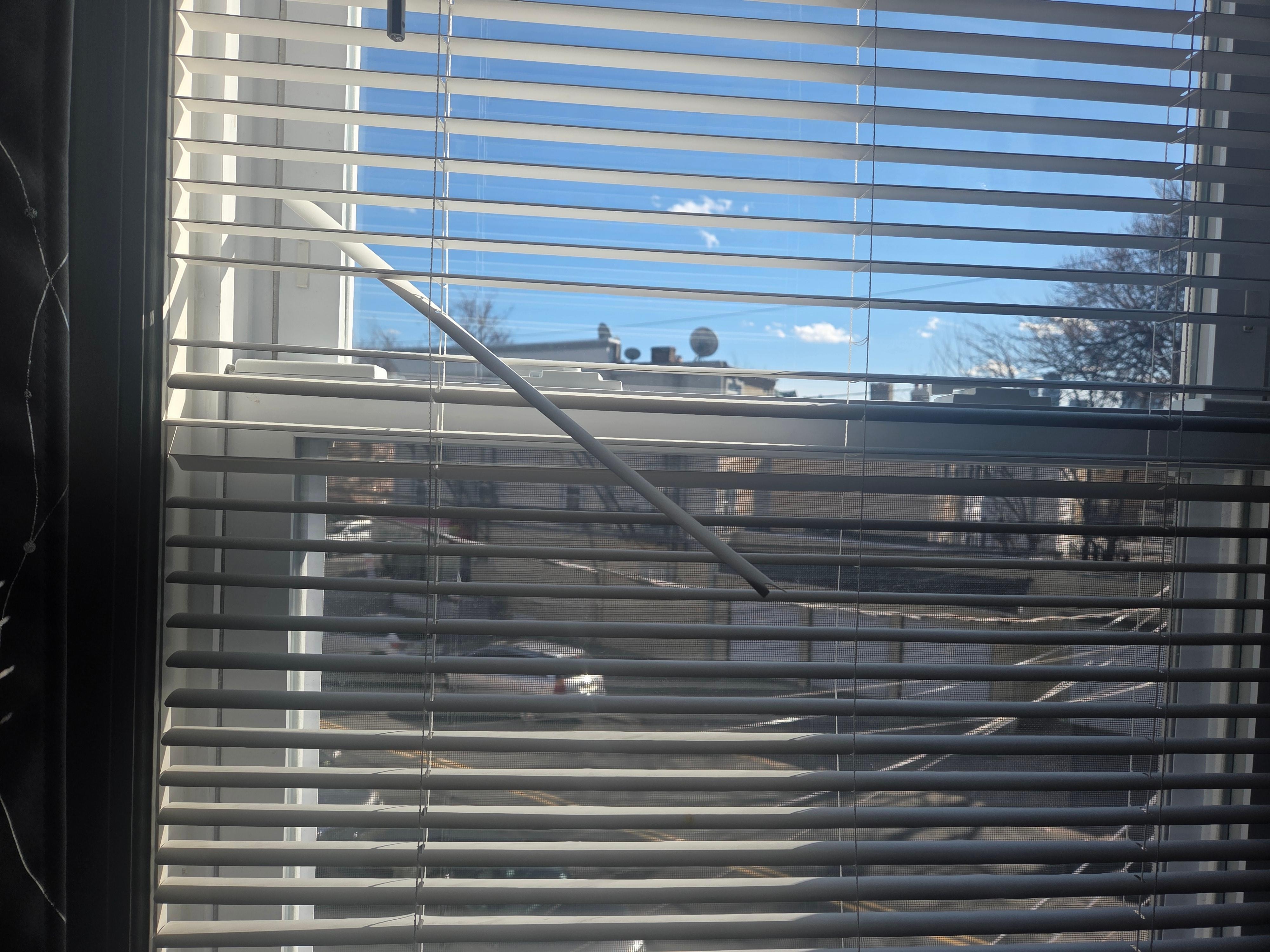 Broken blinds in most of the rooms.