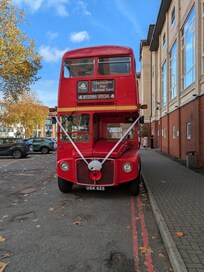 A weeding bus near the parking of the hotel.