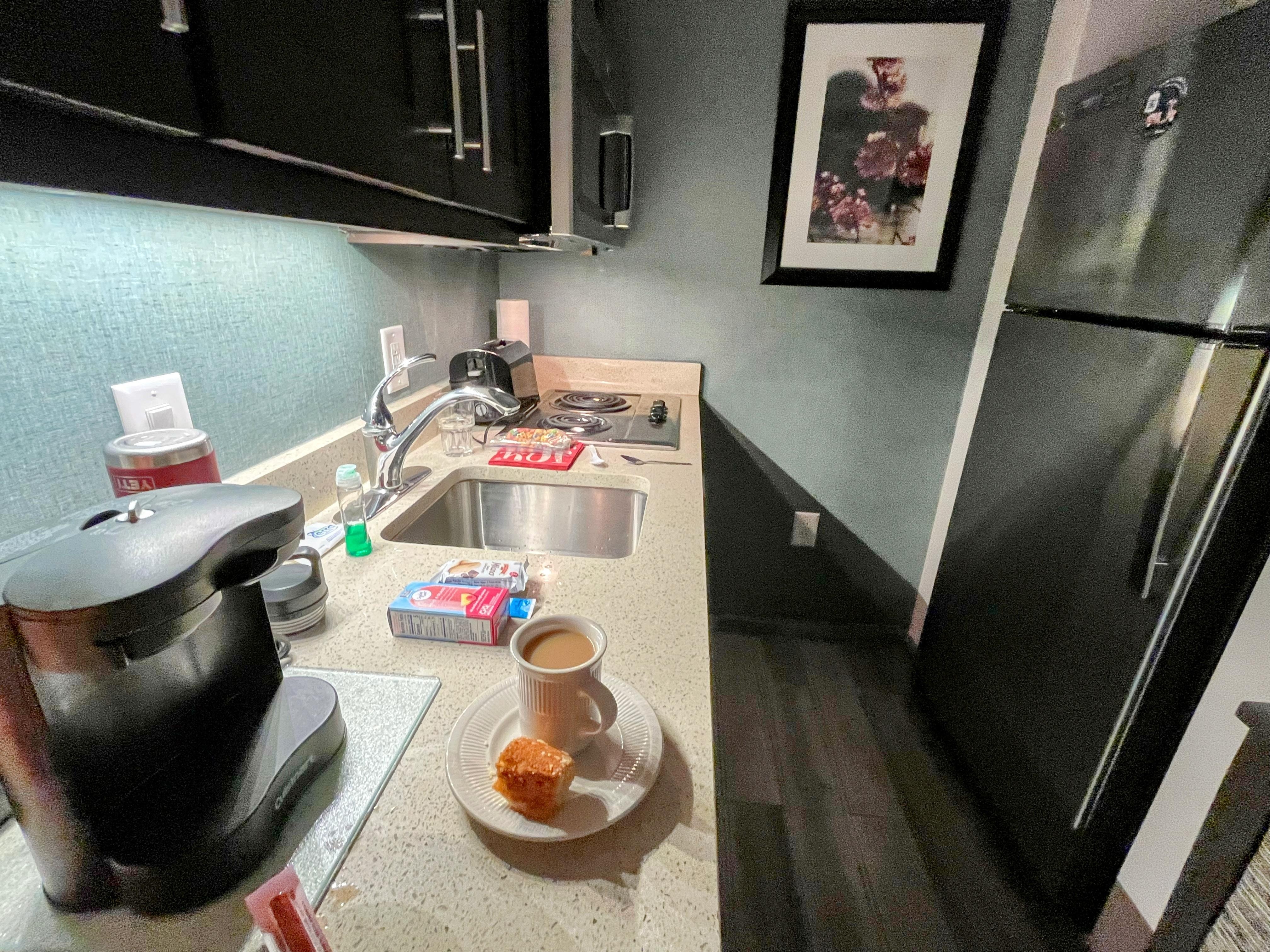 The mini kitchen isn’t mini at all!!!  Has all you need.