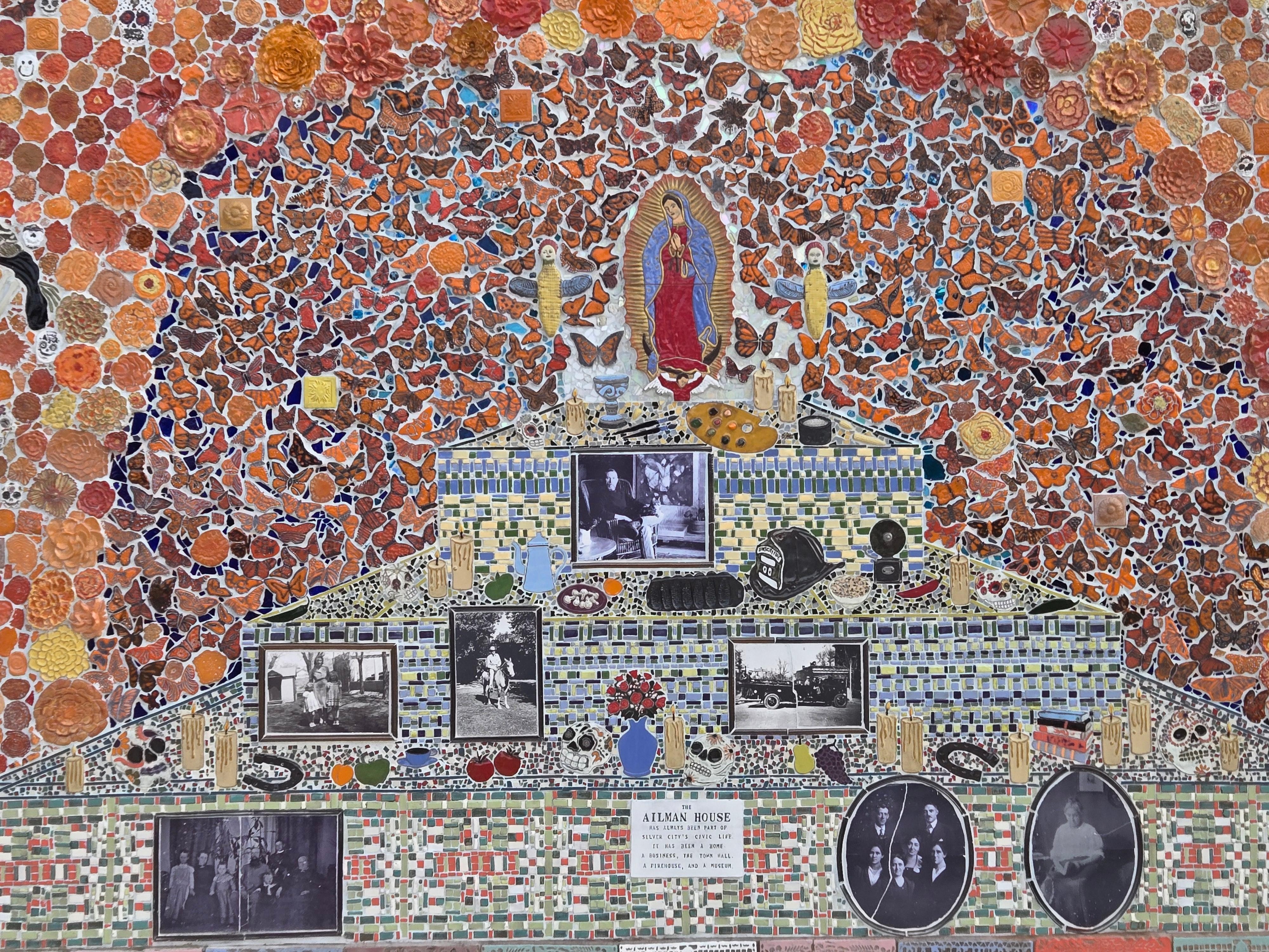 More tile on a historical storied mural along Big Ditch park.