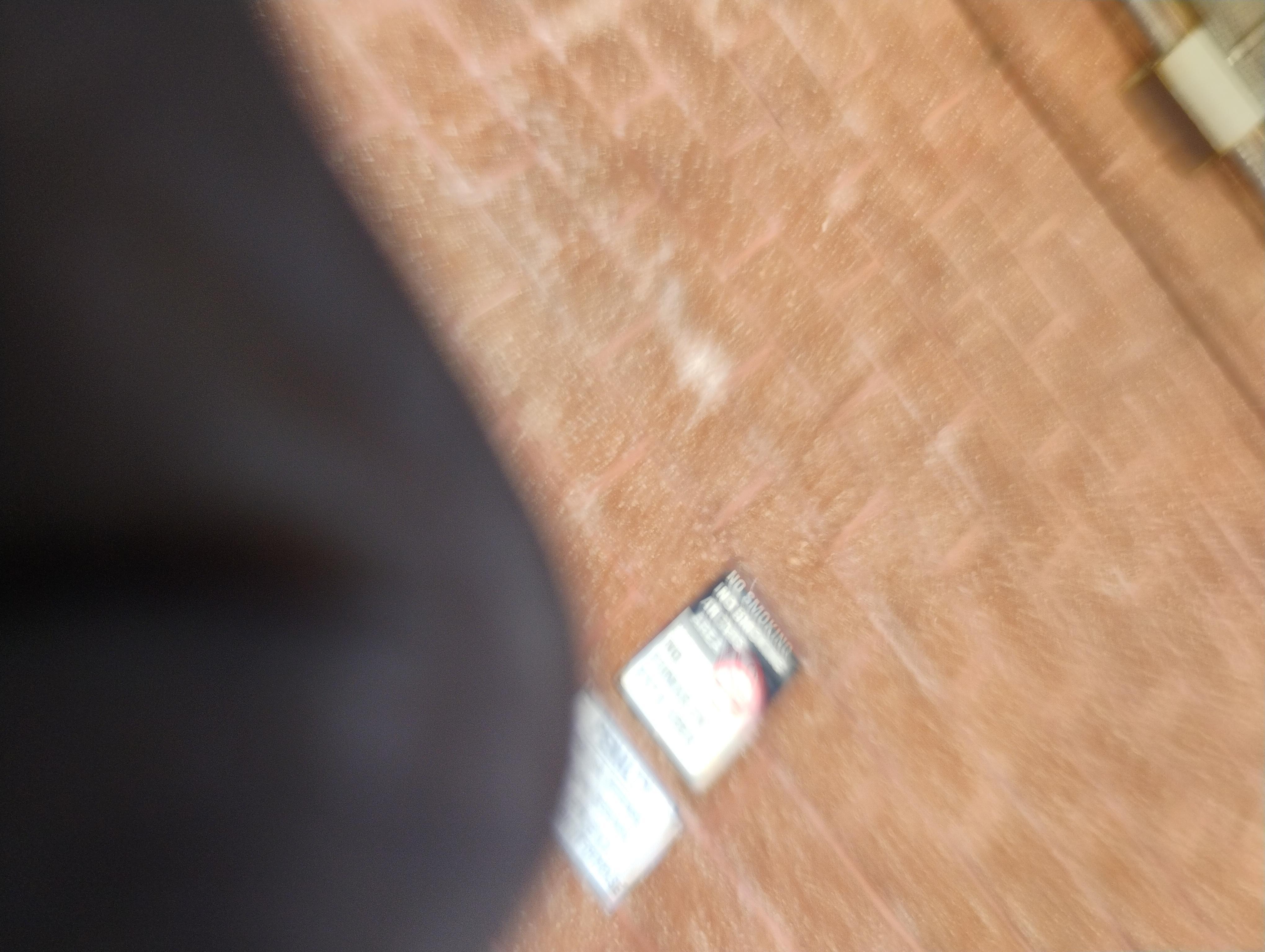 Electrical faceplate off the wall with electric light plug in...