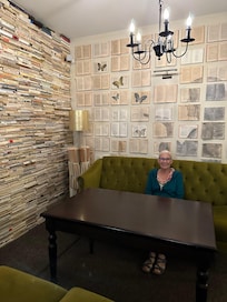 In the lounge with book walls on either side.