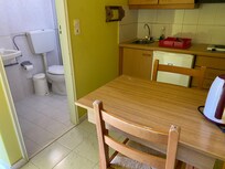 Kettle on right .. power socket on wall on left